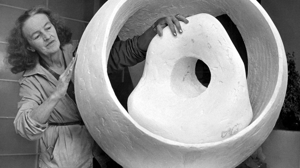 Barbara Hepworth with one of her sculptures